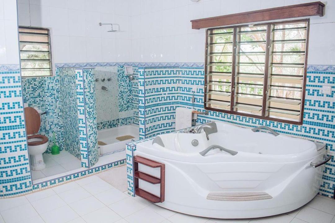 Kijani Cottages Diani Diani Beach Esterno foto
