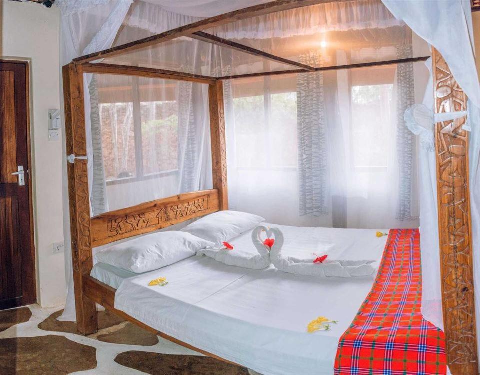 Kijani Cottages Diani Diani Beach Esterno foto