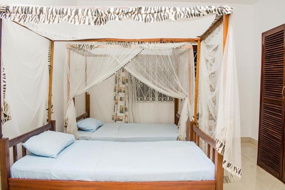 Kijani Cottages Diani Diani Beach Esterno foto