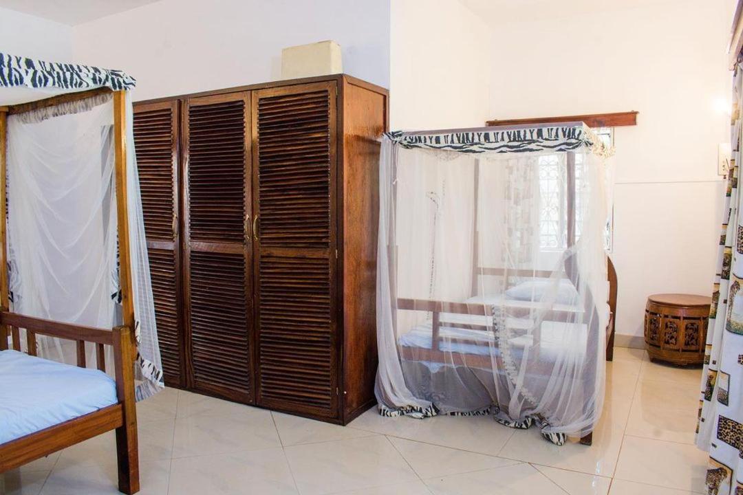 Kijani Cottages Diani Diani Beach Esterno foto